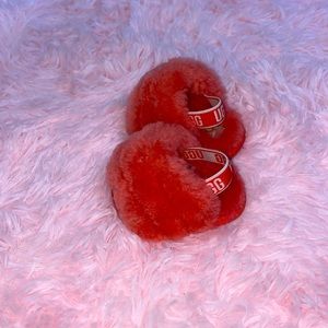 Orange/peach baby ugg slides